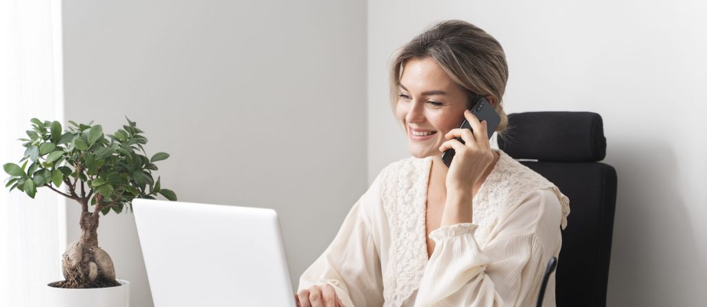 medium-shot-smiley-woman-talking-phone